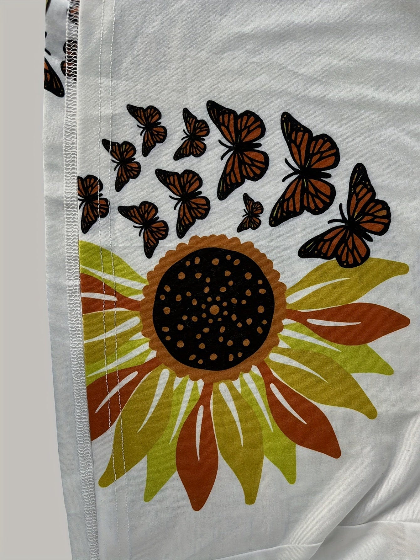 Clara｜Robe d'été à bretelles motif tournesol